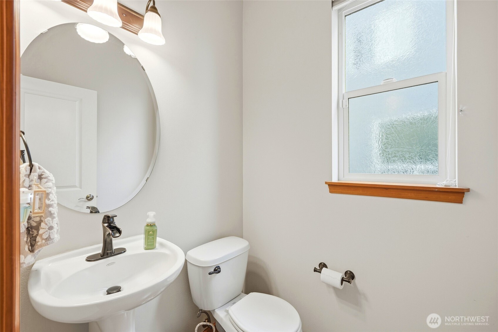 Half bath on main floor is perfect for guests.