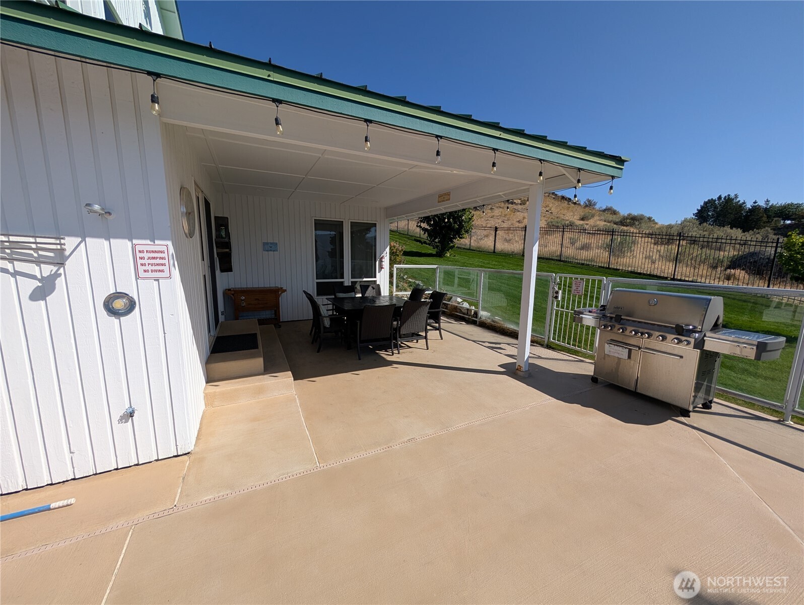 covered deck area by pool