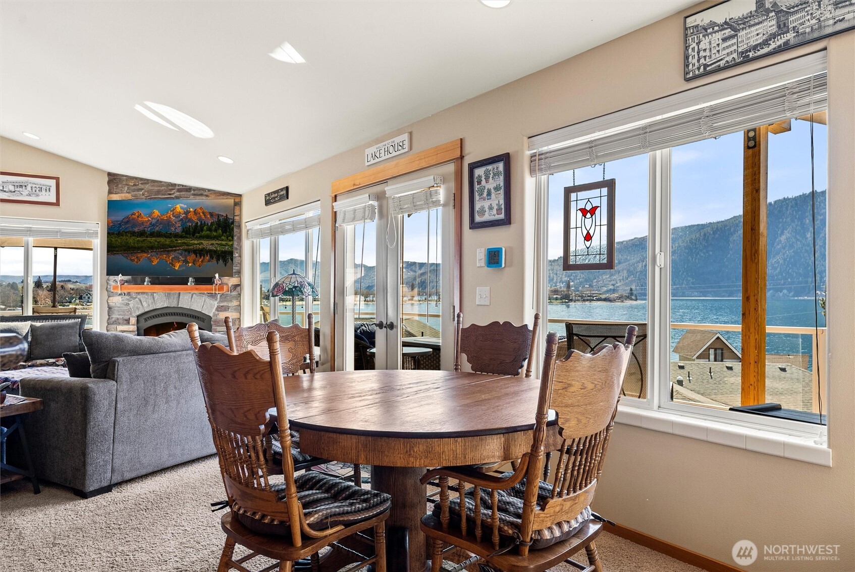 Dining area and entrance to primary 1 Bedroom suite, kitchen to right