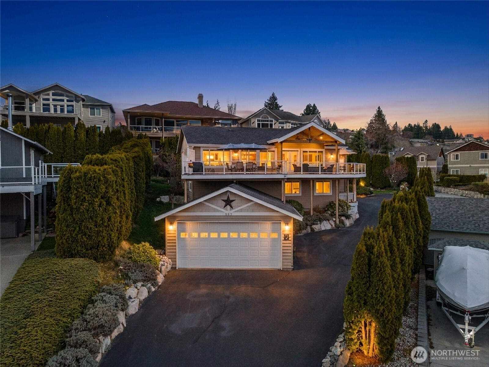 Twilight N E side view and extra driveway parking