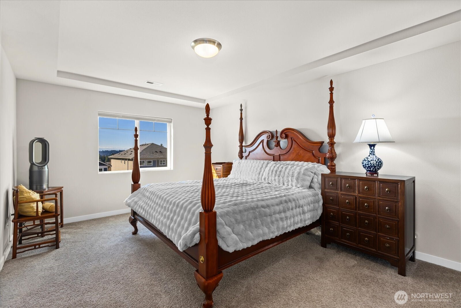 Primary bedroom with walk-in closet