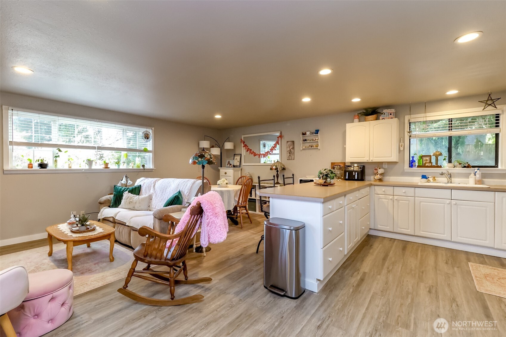 Enter into your private backyard oasis with brick pavers and a private shaded entryway