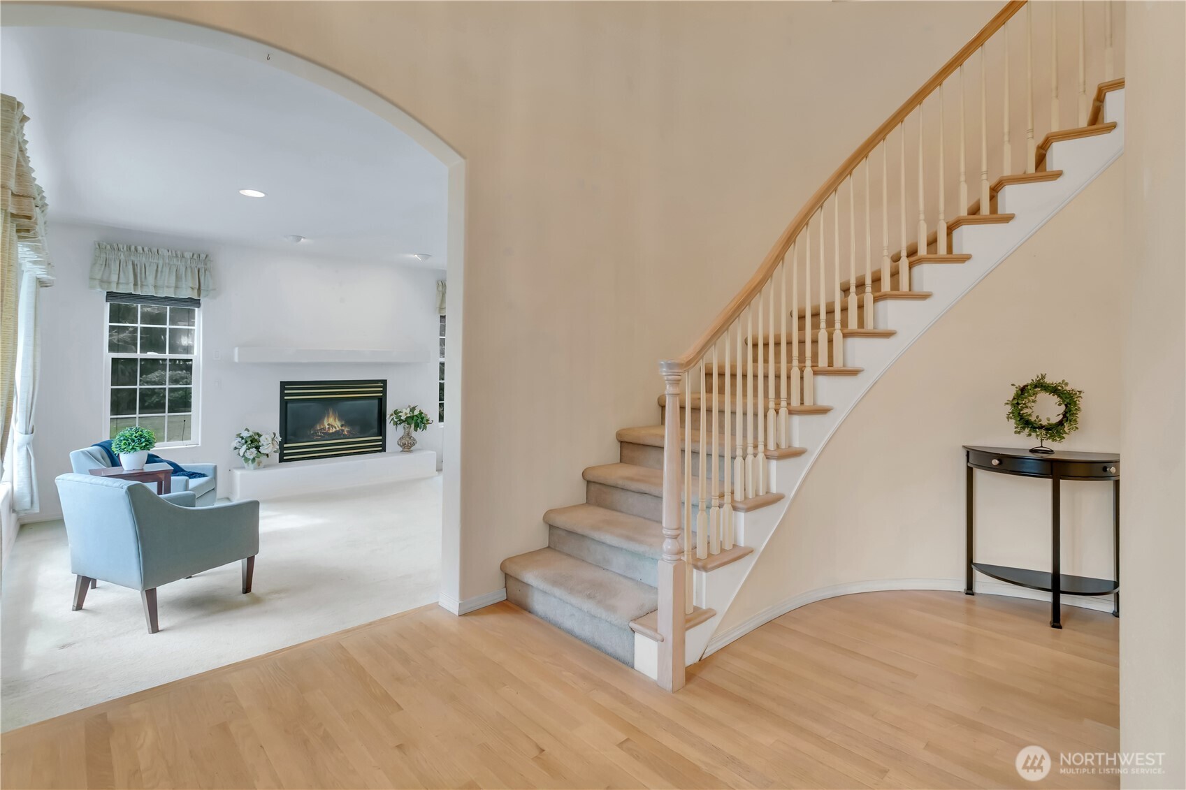 Grand entry with curved staircase