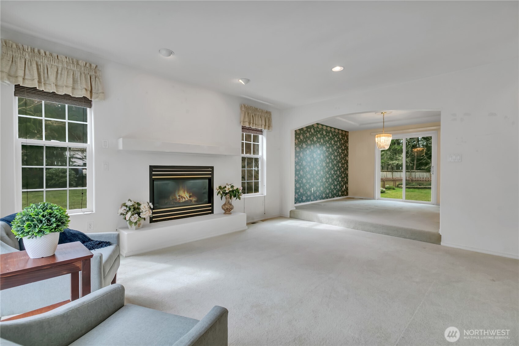 Formal living room with gas fireplace