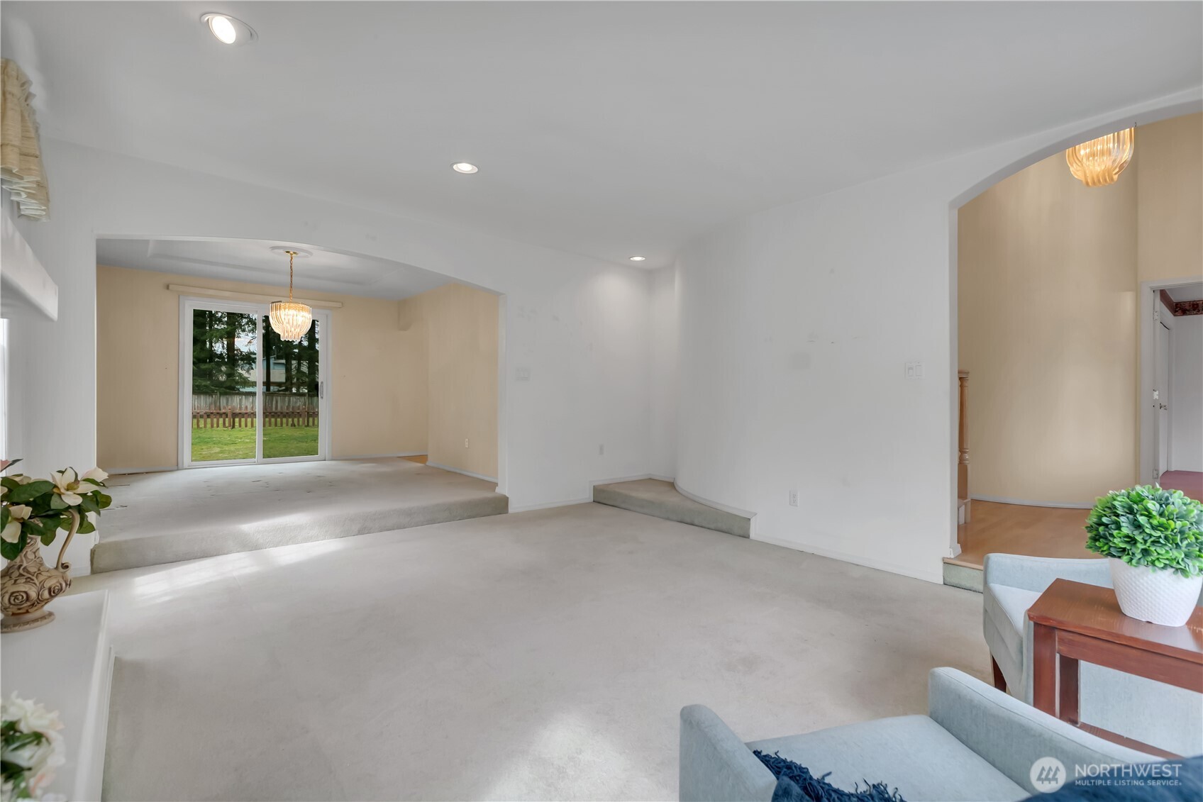 Looking from the formal living room into the formal dining room
