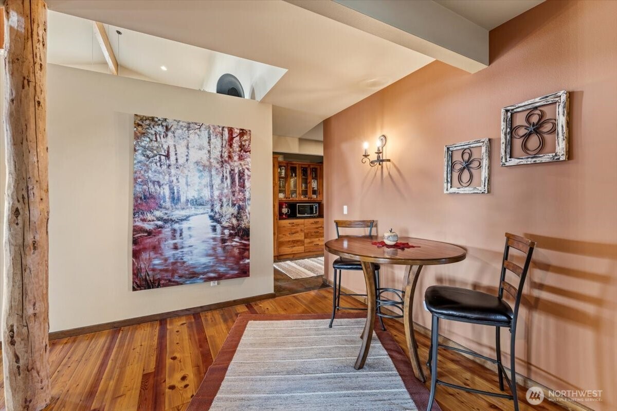 Bistro set and transition between pantry and bedrooms