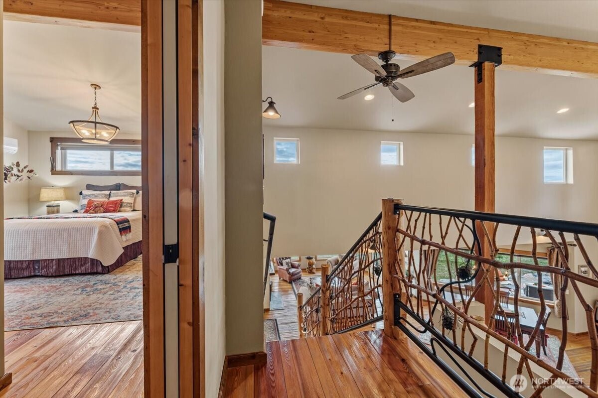 Upstairs transition between hallway and primary ensuite