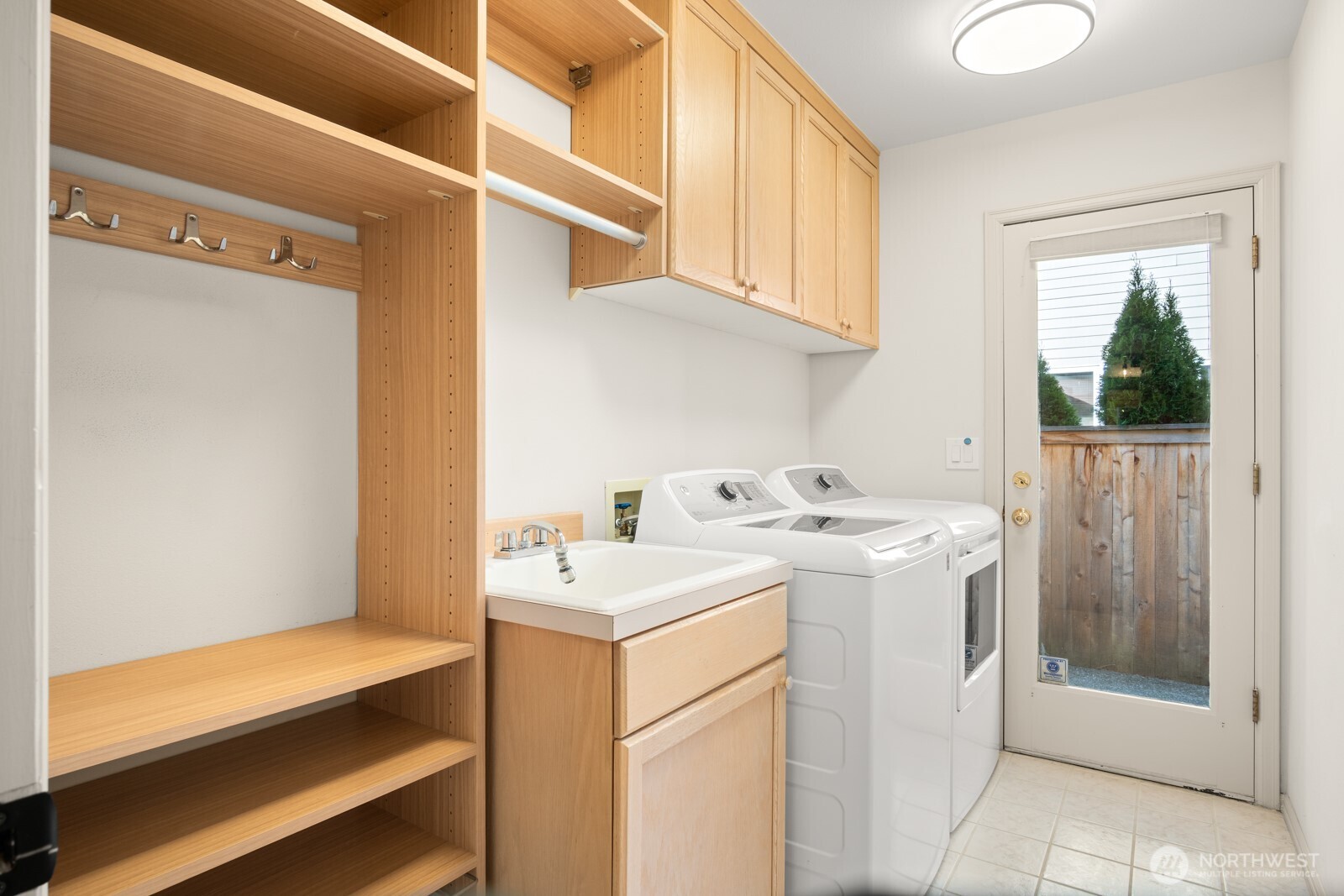Laundry room with custom built-ins