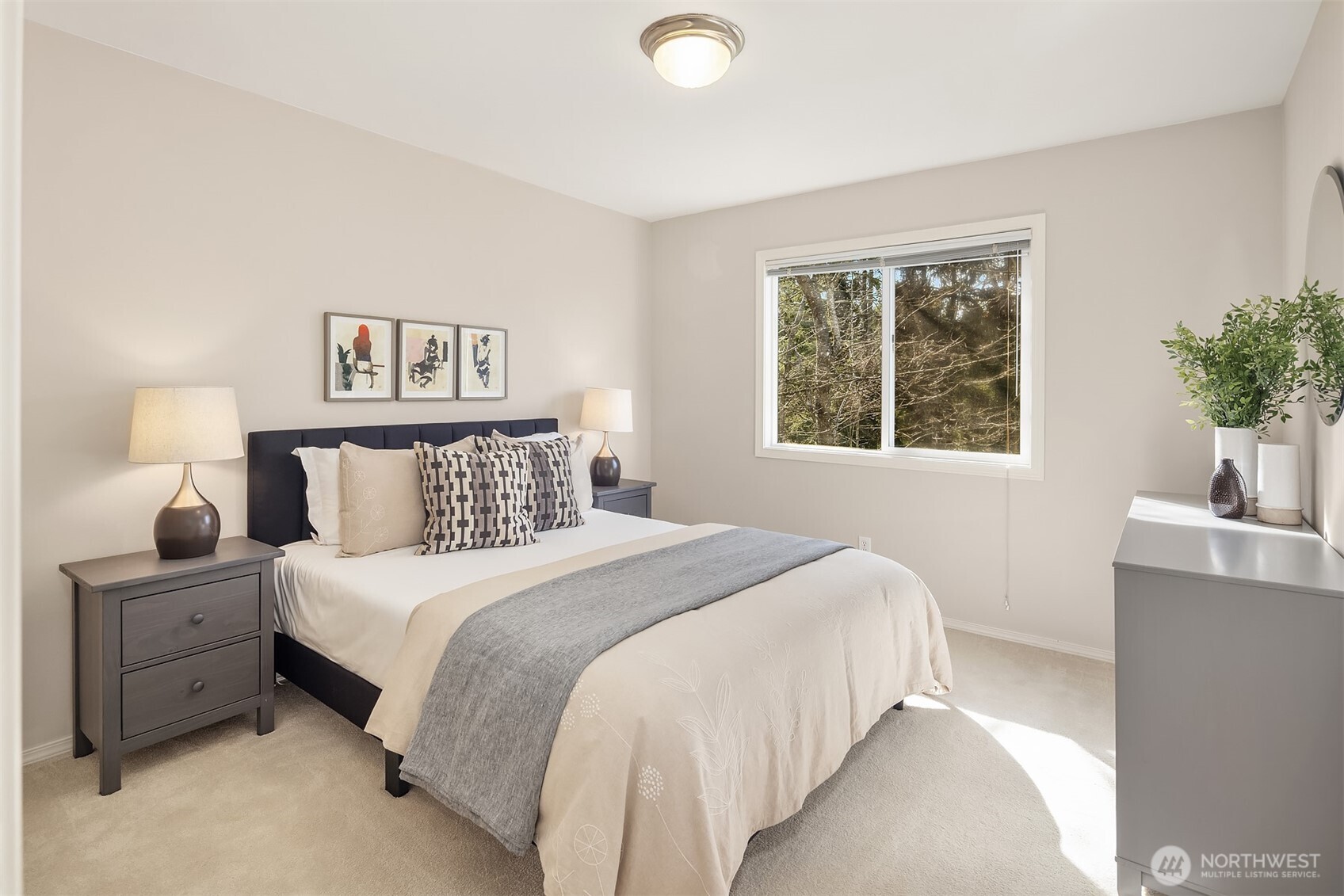 The laundry room is conveniently located on the upper floor.