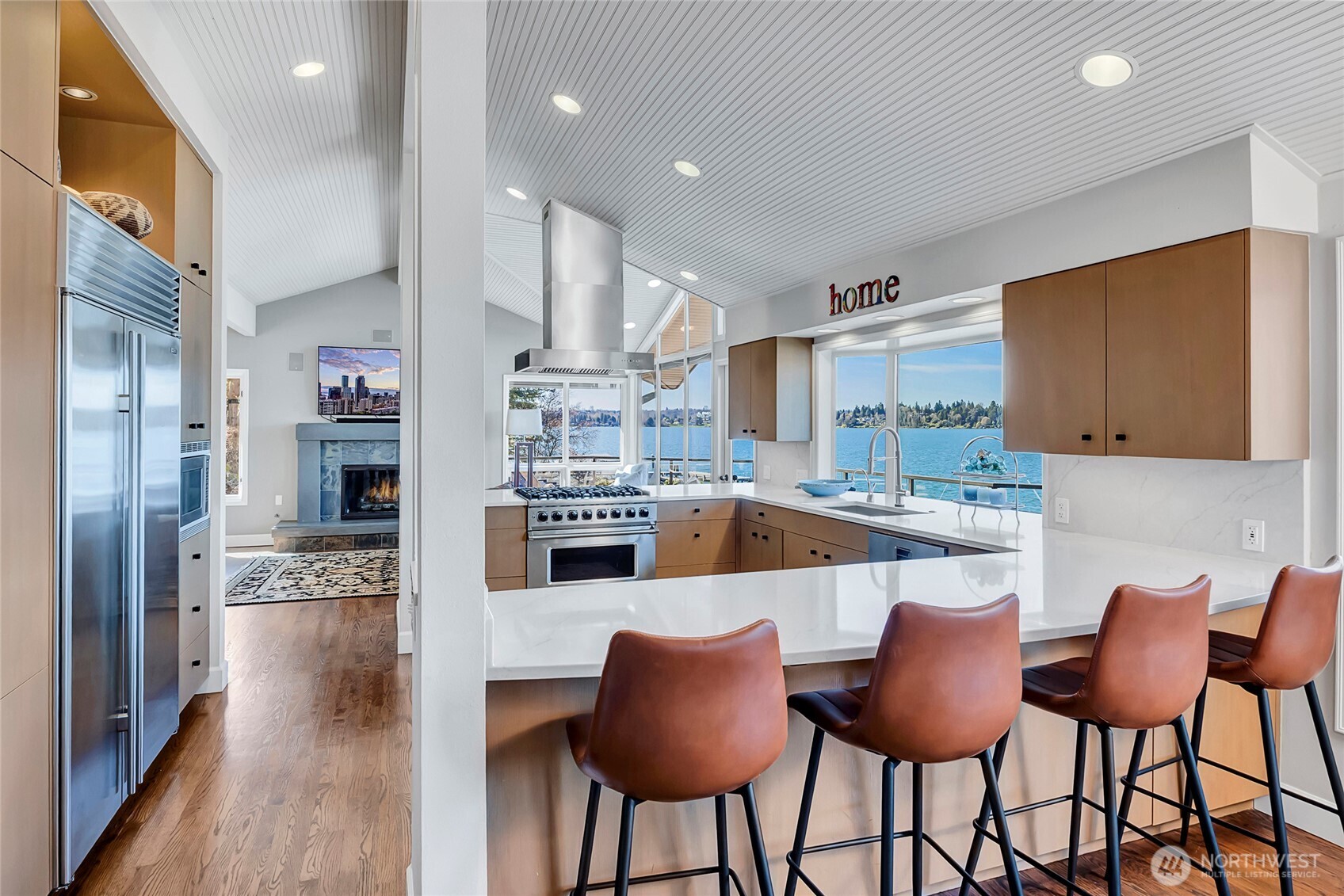 The kitchen is beautifully positioned at the heart of the home, seamlessly open to both the living and family rooms, creating a natural, circular flow that is ideal for entertaining.