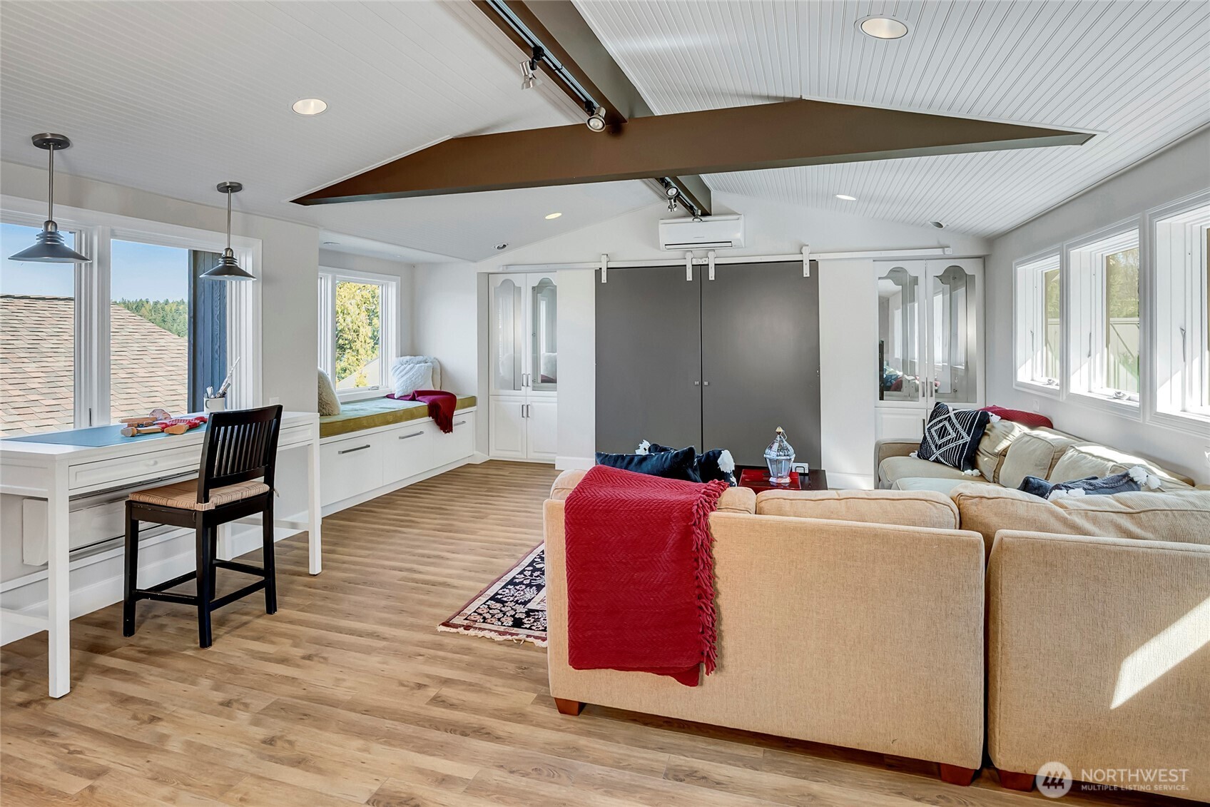 The space above the three car garage offers endless possibilities, a spacious and versatile area perfect for a craft room, art studio, yoga space, or even a home business, both convenient and full of potential.