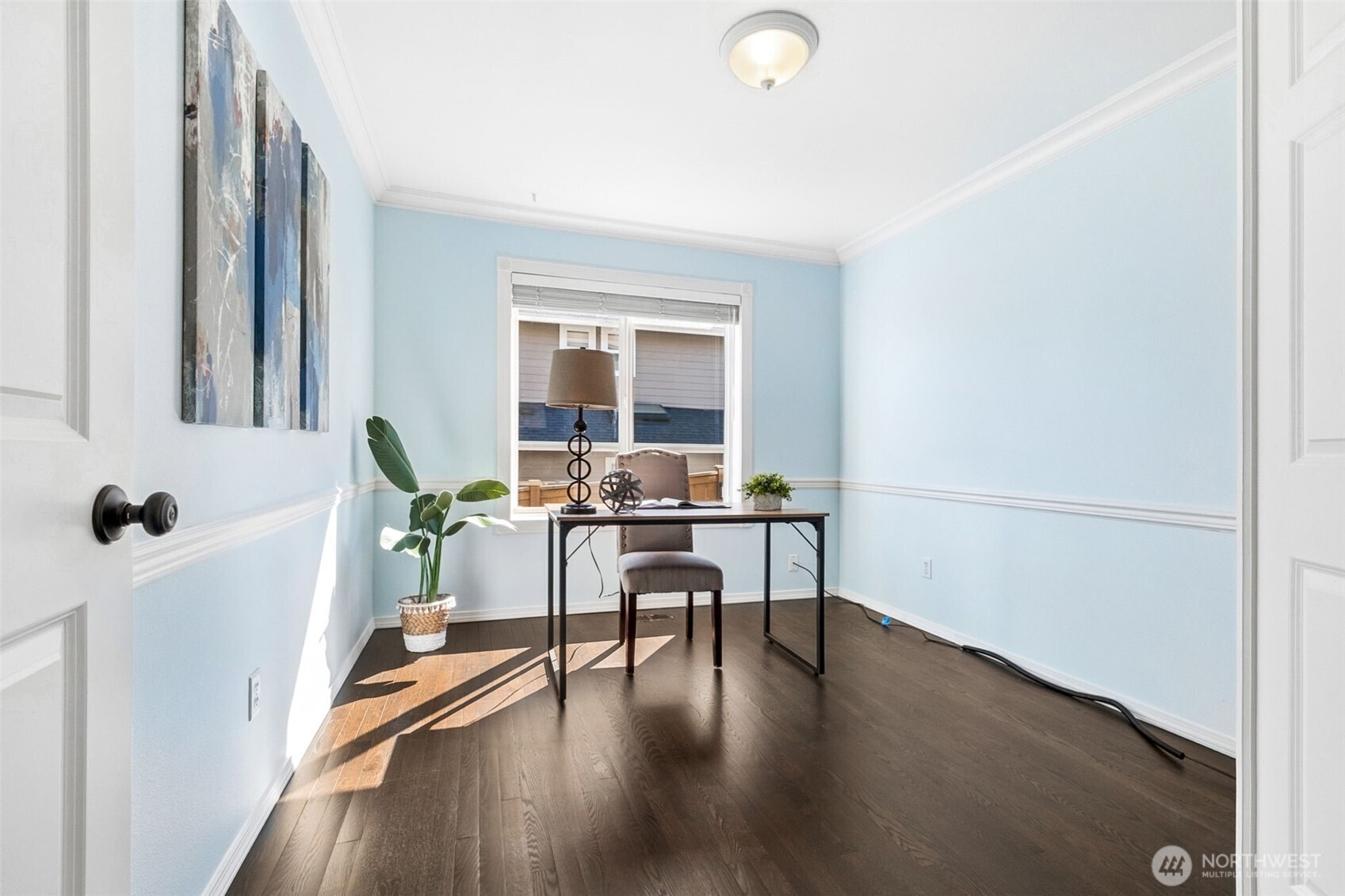 The architectural detail continues into the main floor office space -- perfect flex space to meet your needs!