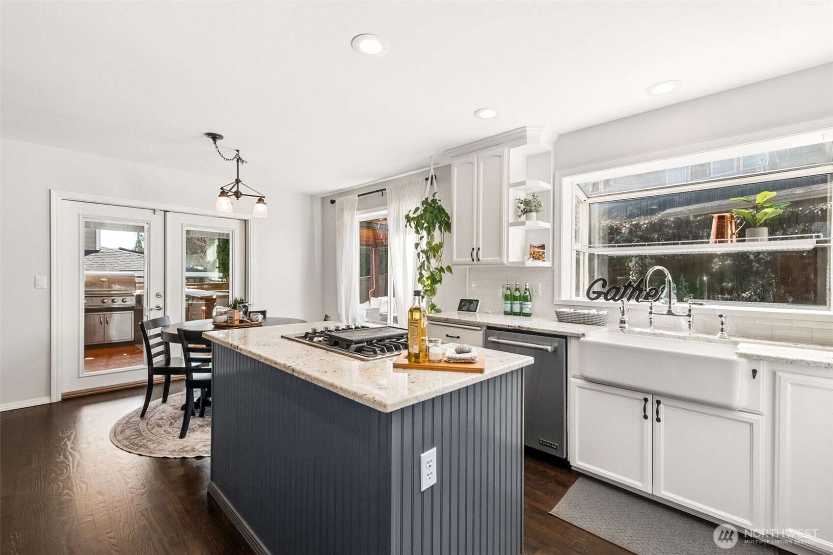 Slip out the French doors with the drinks & condiments - barbecue's on!