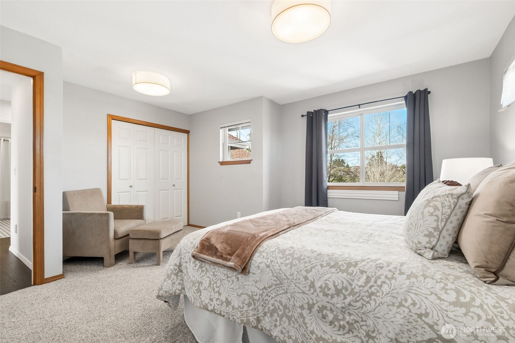 One of three additional bedrooms - with large closet and lots of windows