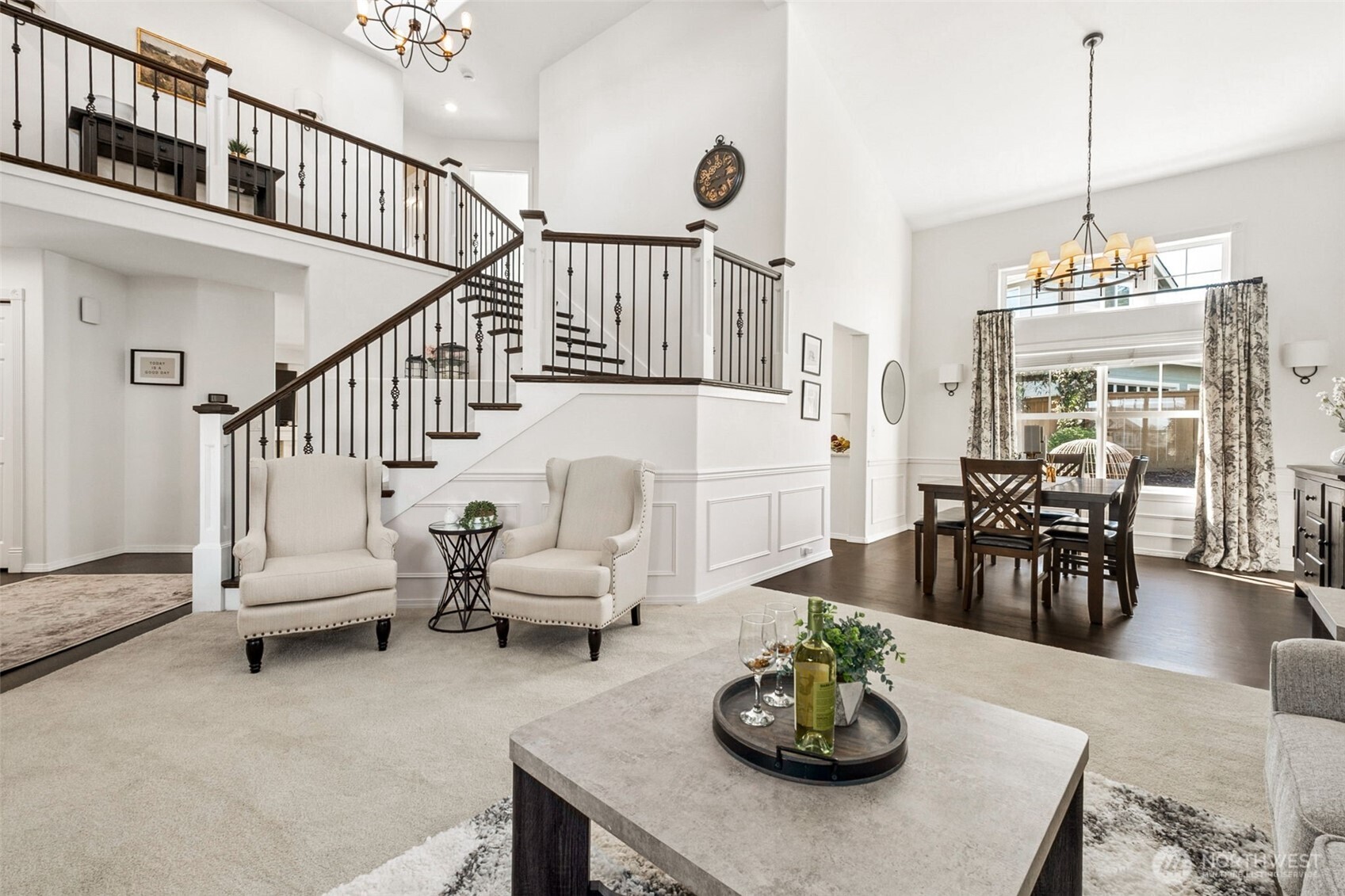 Seamless flow between living and dining areas, with soaring ceilings and elevated touches creating an inviting space for everyday living and entertaining.