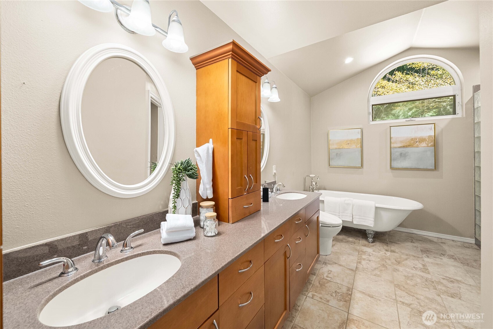 Private primary retreat with calming views and direct access to the deck.