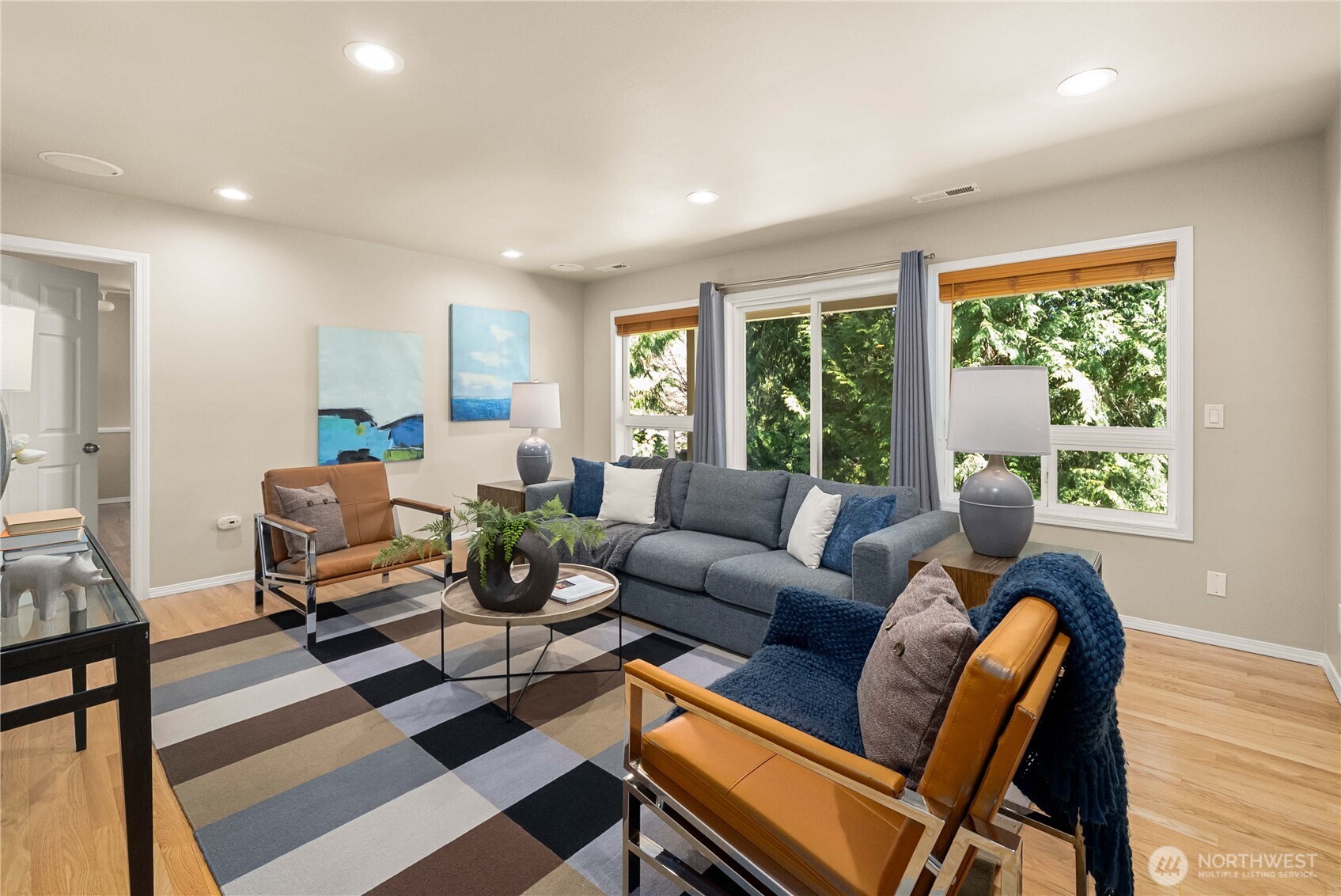 Spacious bonus room with patio access - Flexible space for work, play, or guests.