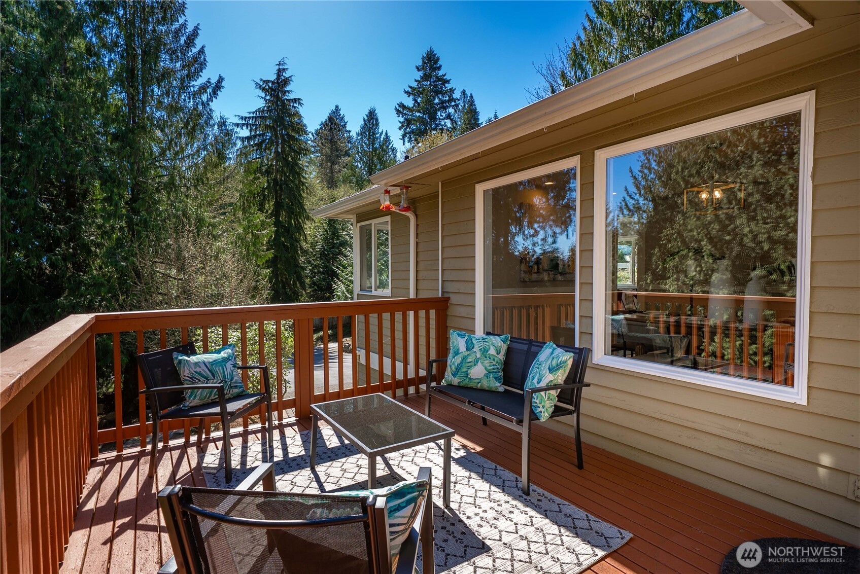 Perfect setting for summer gatherings, surrounded by towering trees and natural beauty.