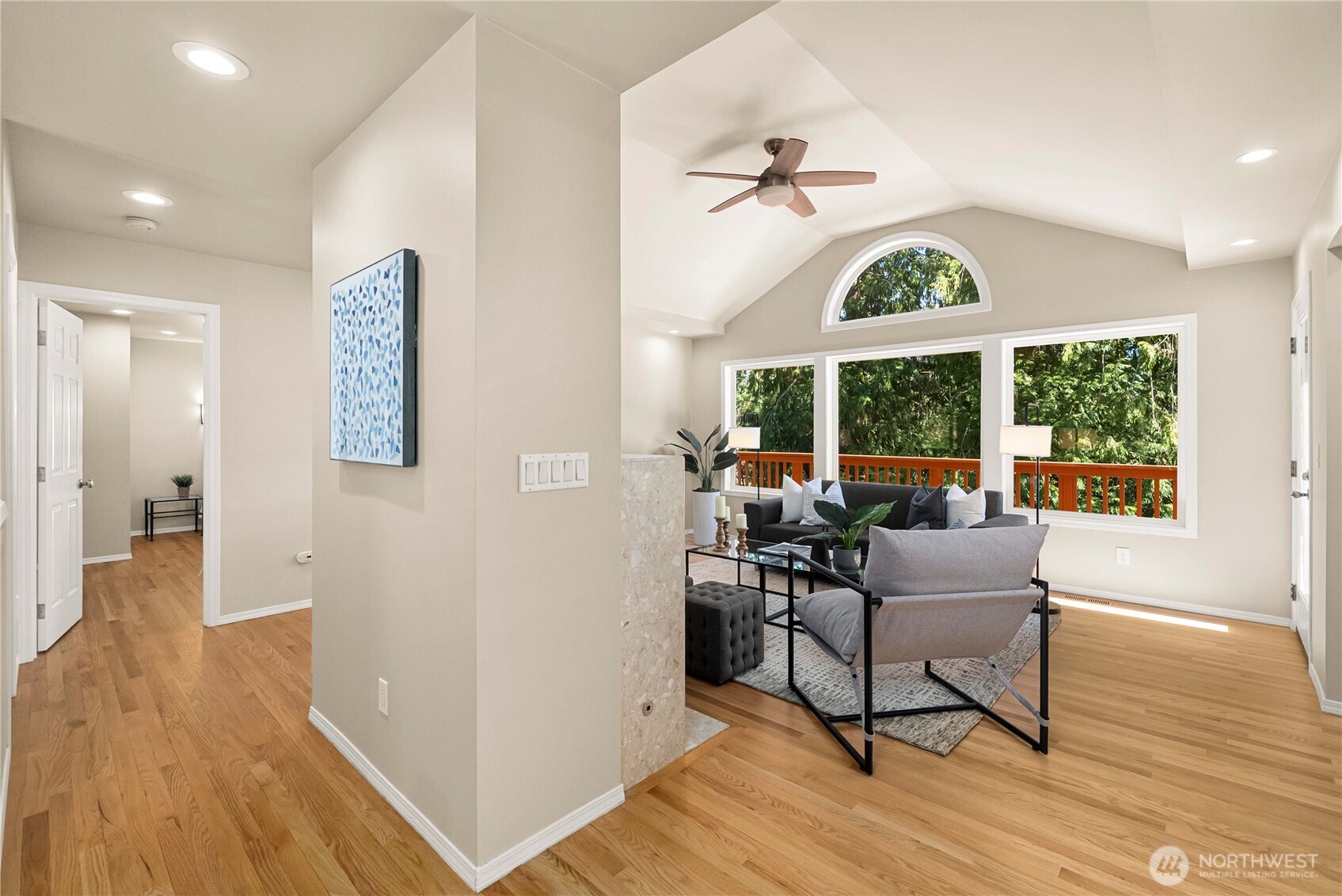 Inviting entry with warm natural light.