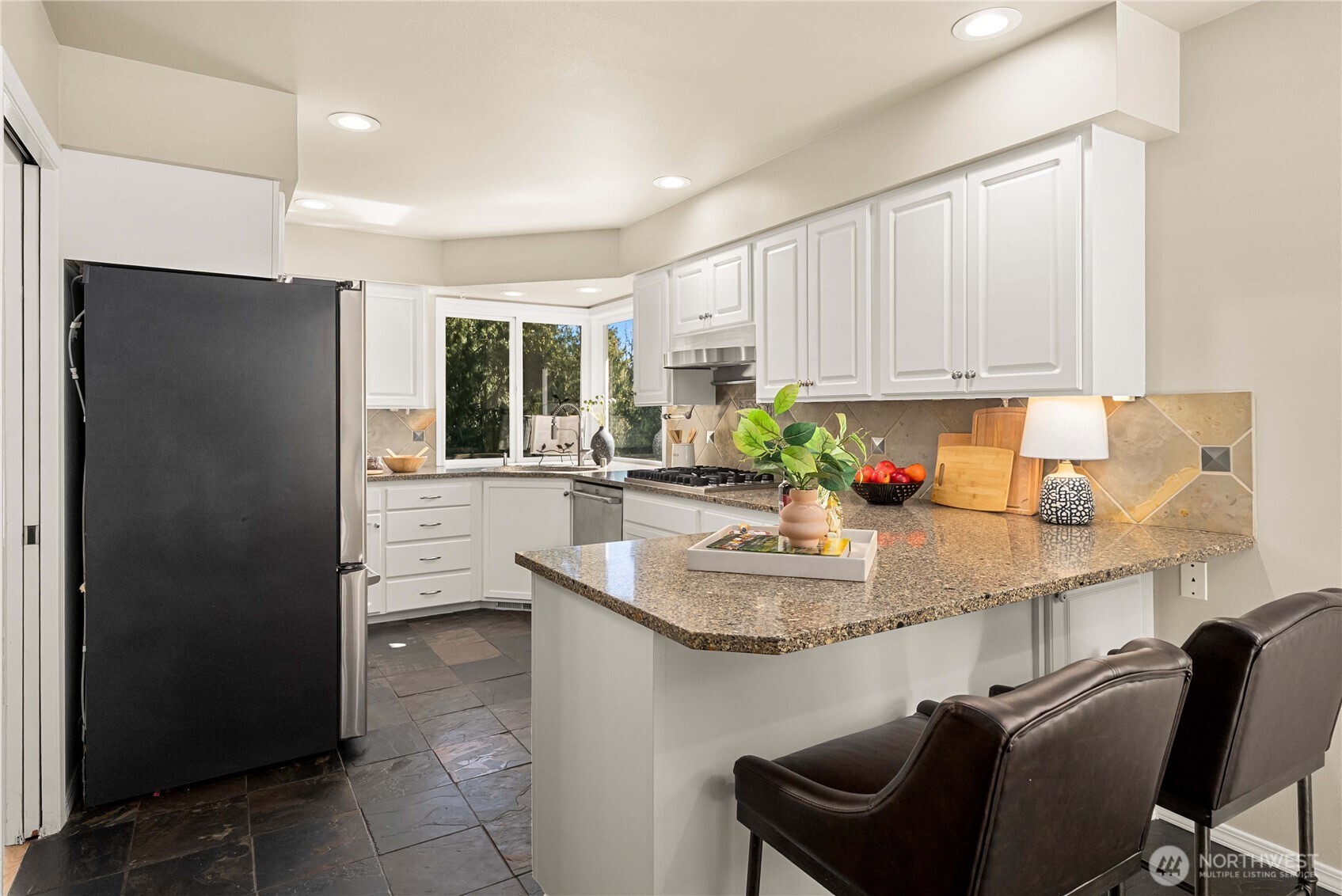 Vaulted ceilings create an expansive feel.