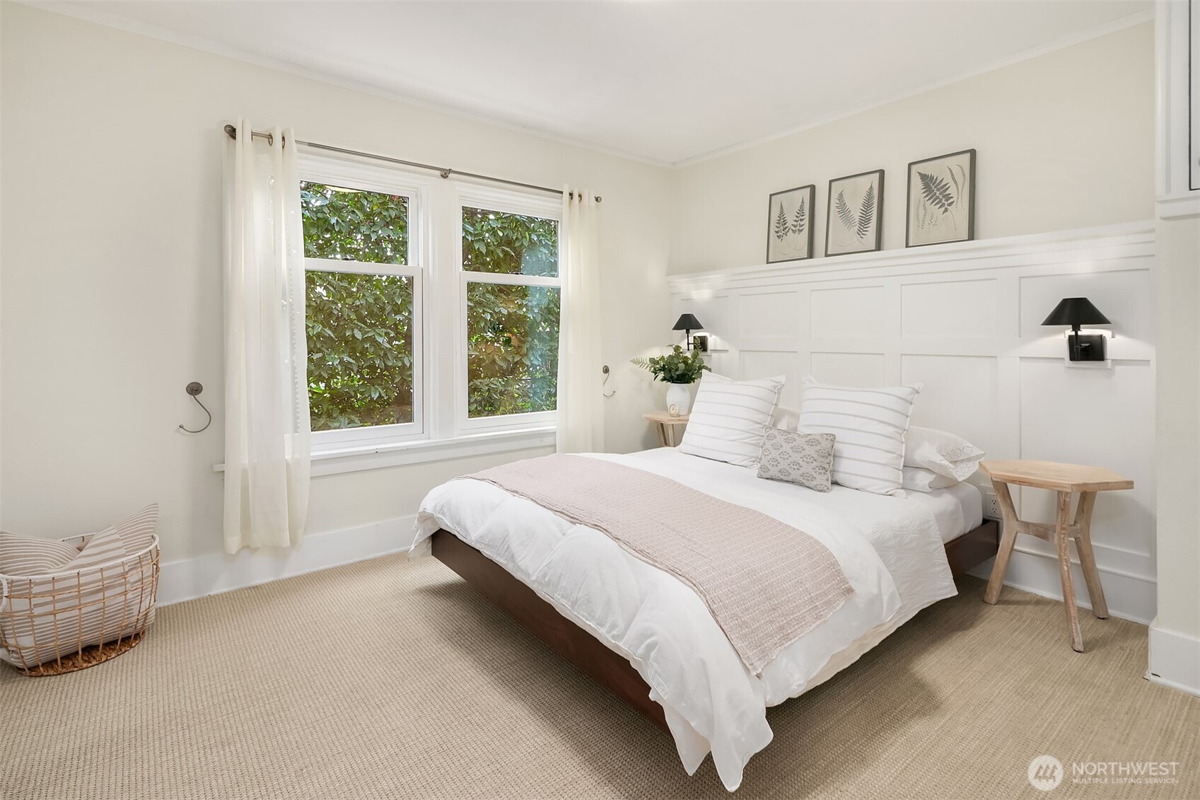 Two main floor bedrooms, each with green outlooks and ample closet space.