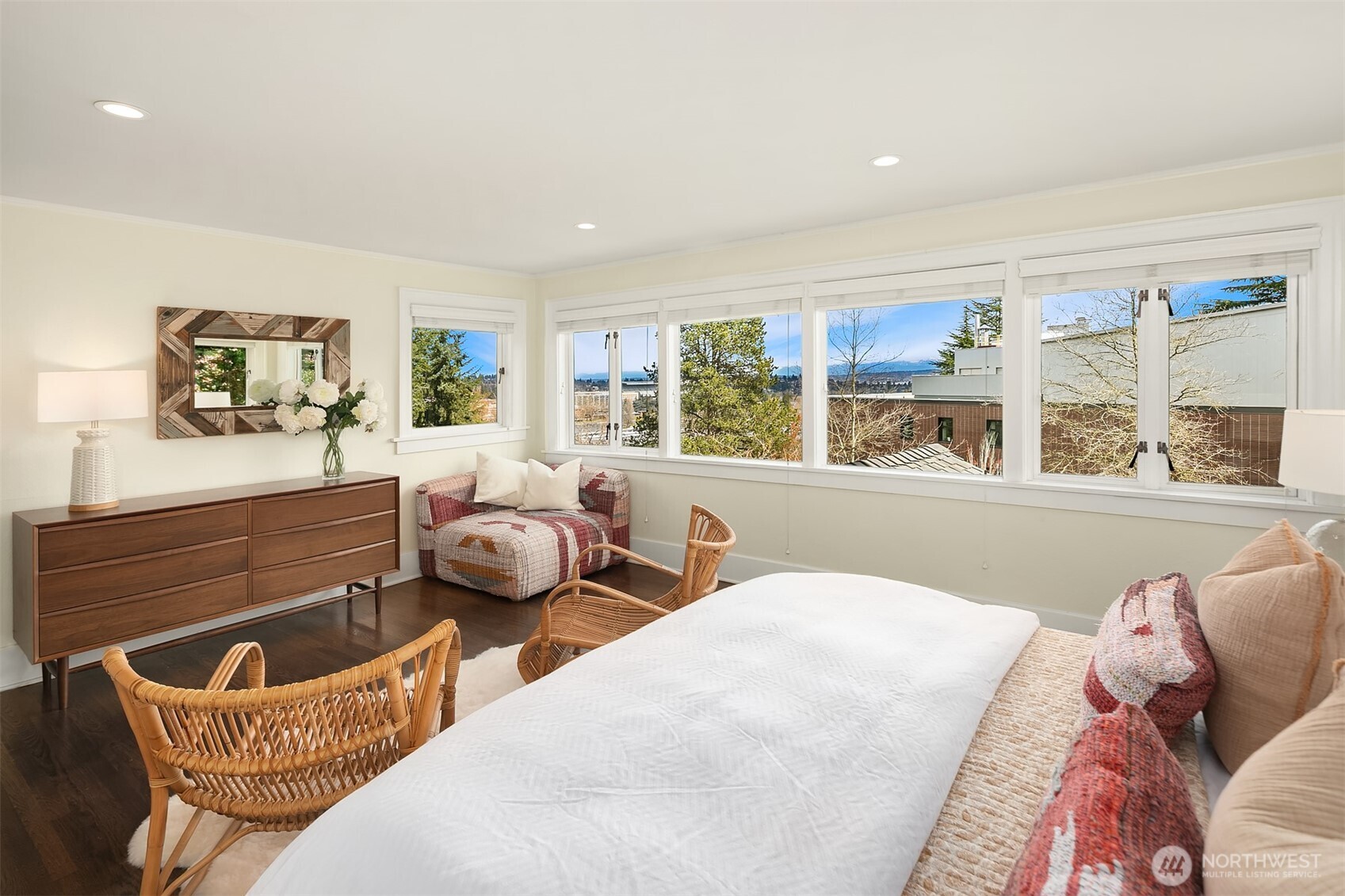 Spectacular view primary with a wall of windows to enjoy the views and morning sun!