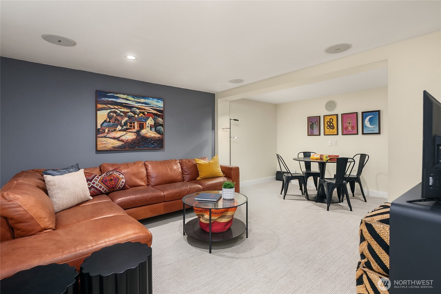 Media room has extra space for game or music area.