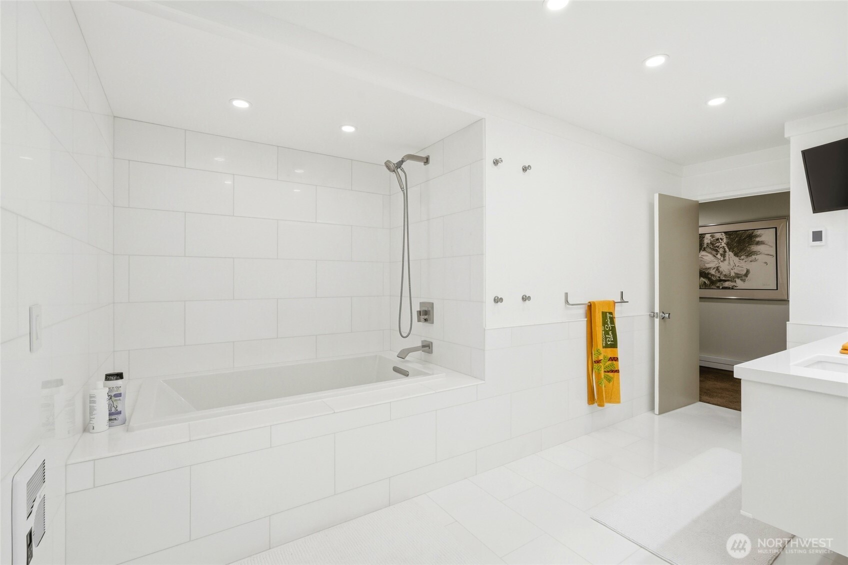 Fully remodeled bathroom on the main floor serves bedroom and office/4th bedroom on main floor.