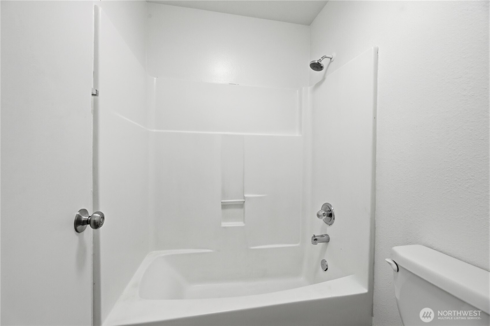 Upstairs bathroom features dual vanities with a door to the primary and separate door to the hallway.