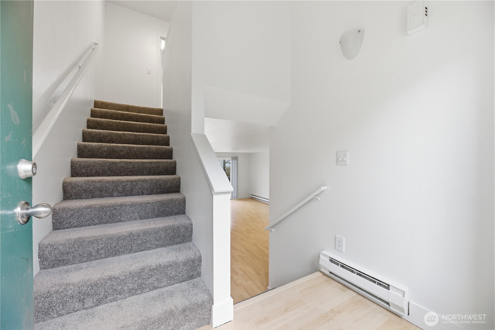 Split level entry with bedroom upstairs and main living downstairs.