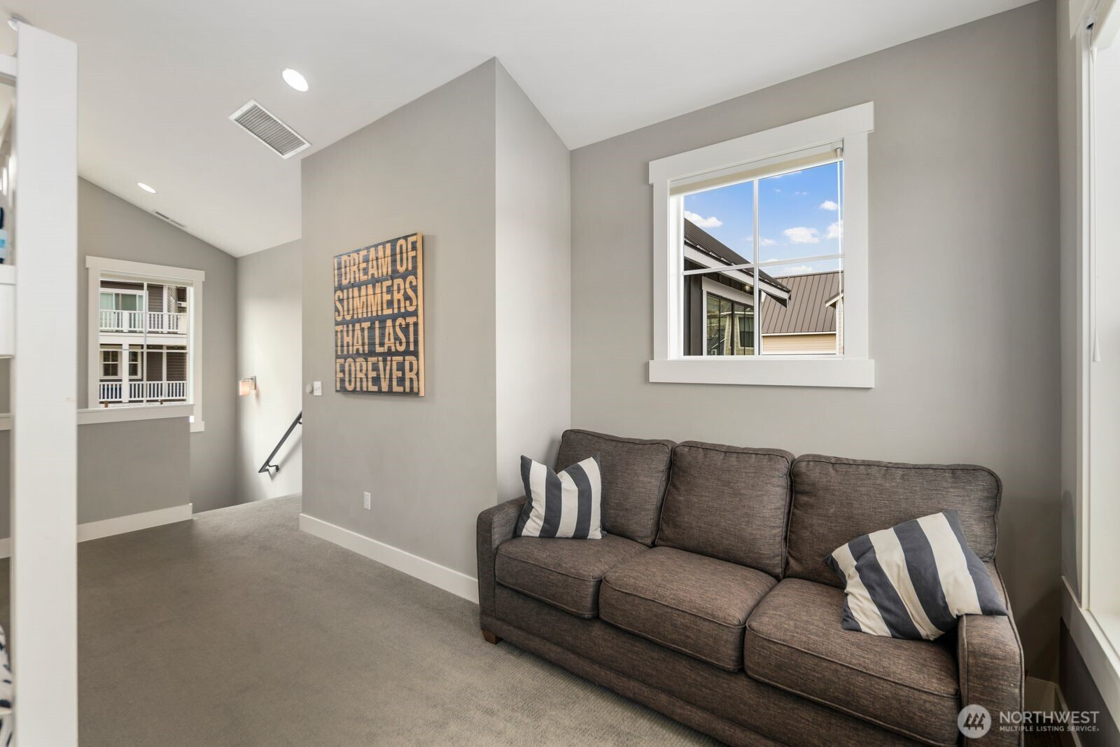 Upper level loft space perfect for media room or overflow bunkroom