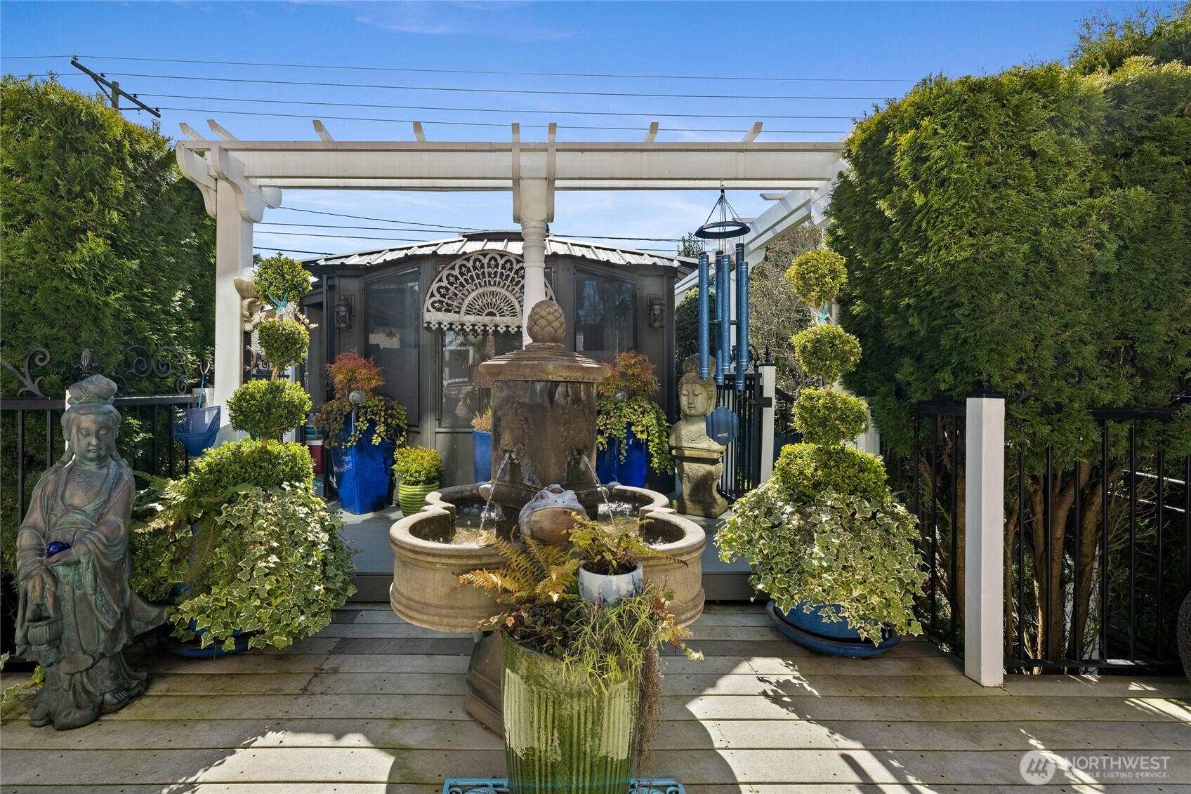 Swim spa enclosure in the rear of picture.