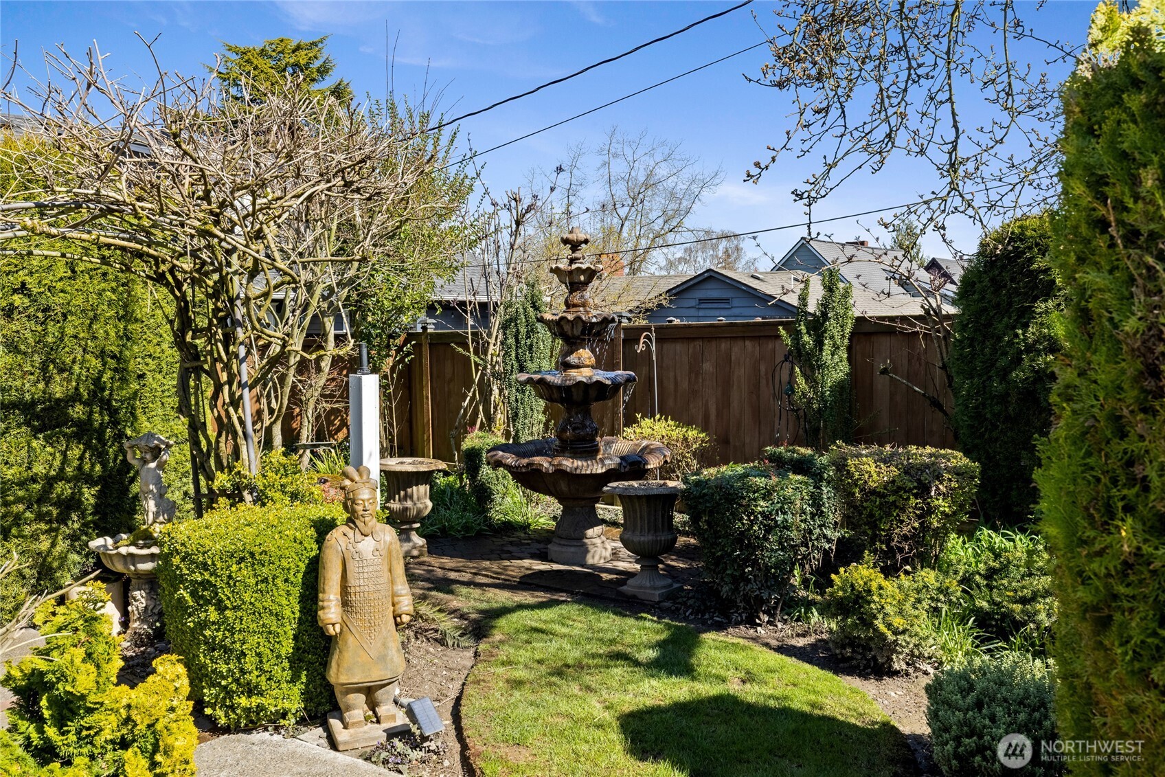 Side yard with additional fountain & interest.