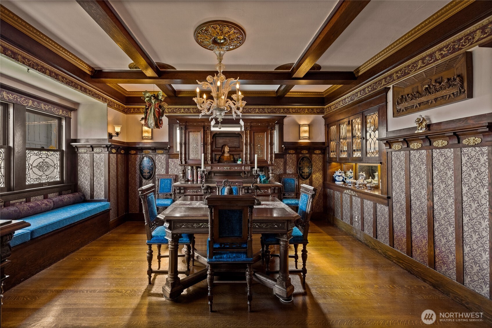 From the upholstered window seat to the built in china in the rear to the china on the right with a pass thru to the kitchen, so gorgeous.