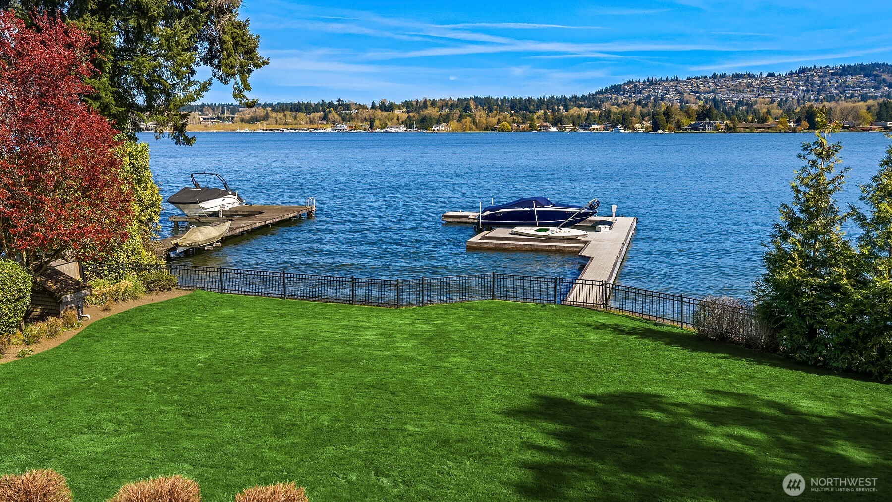A rolling, football style lawn stretches right to the water's edge perfectly framing the 90 front feet of sparkling waterfront.