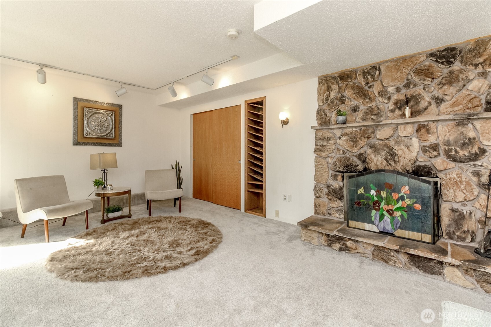Bonus extra storage & another cozy fireplace!