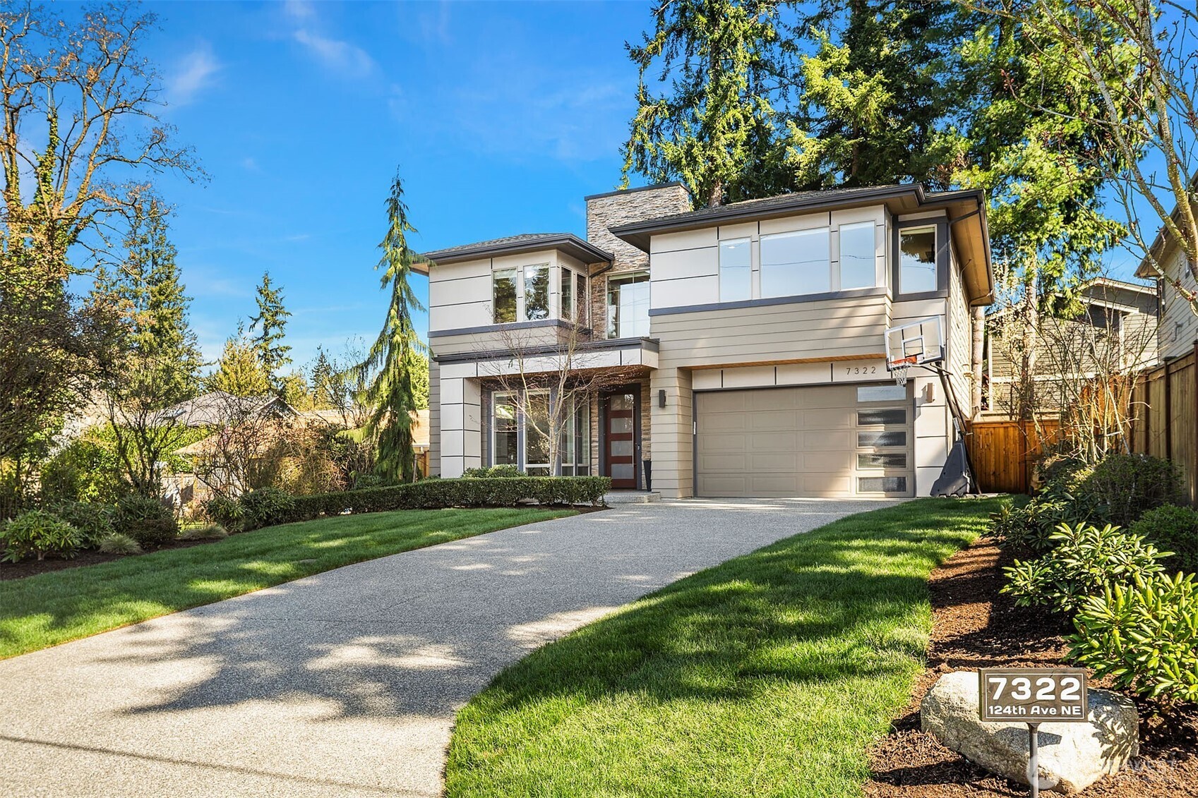 Extra-long driveway, new sod.
