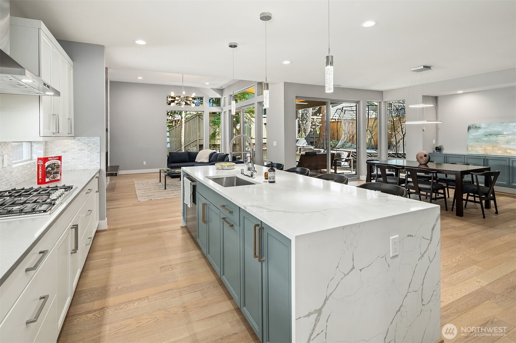 Chef's kitchen with Extra-long Quartz Waterfall Island
