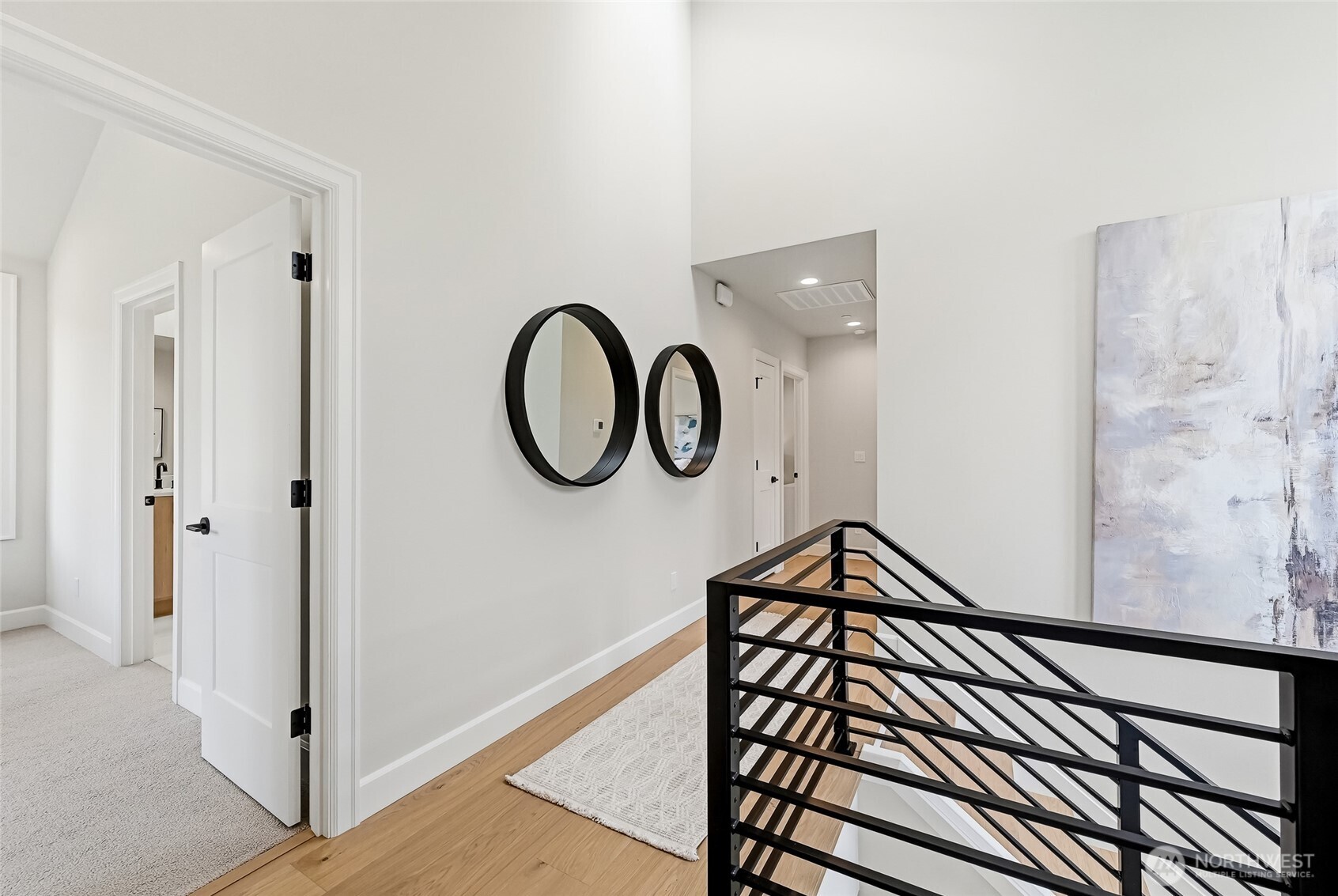 Nice open stairwell leads to generous upstairs landing