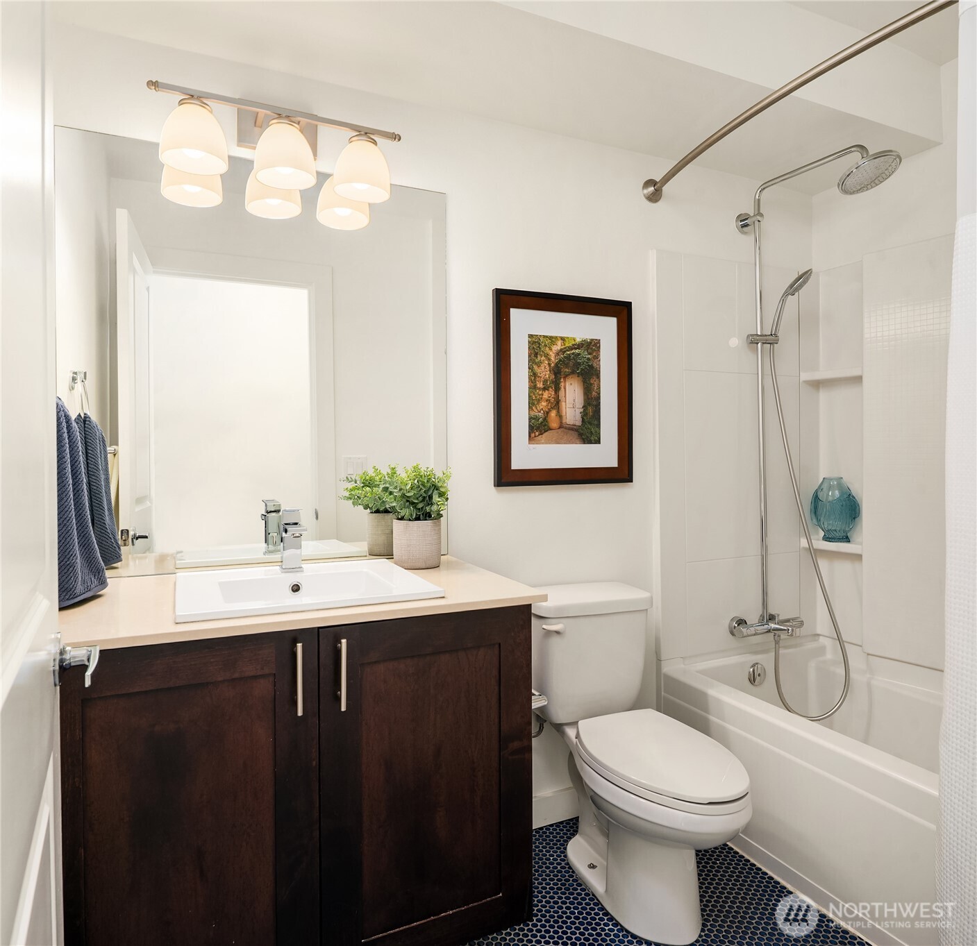 Guest bath with dramatic penny tile.
