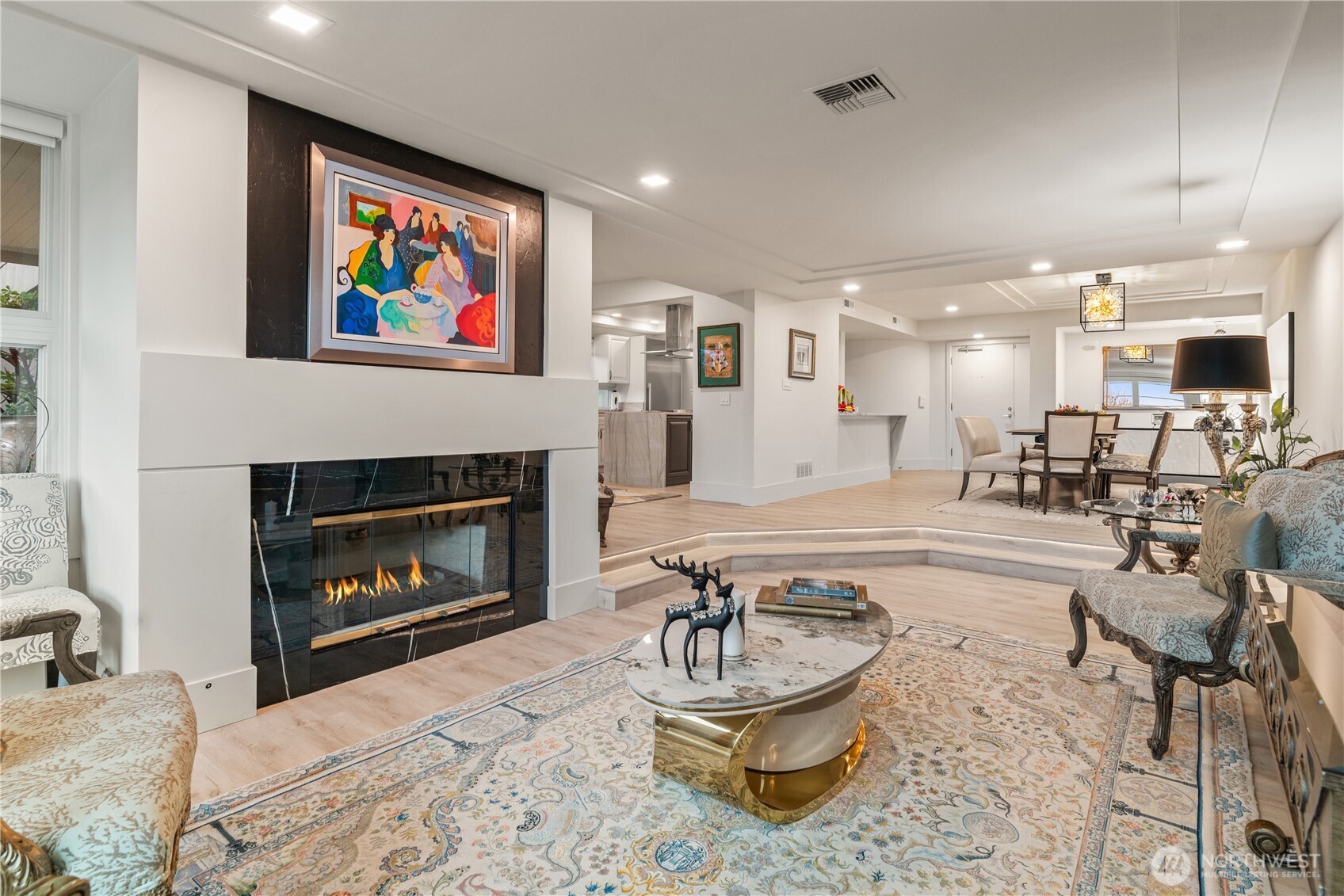 The living rooms offers a gas fireplace for winter months