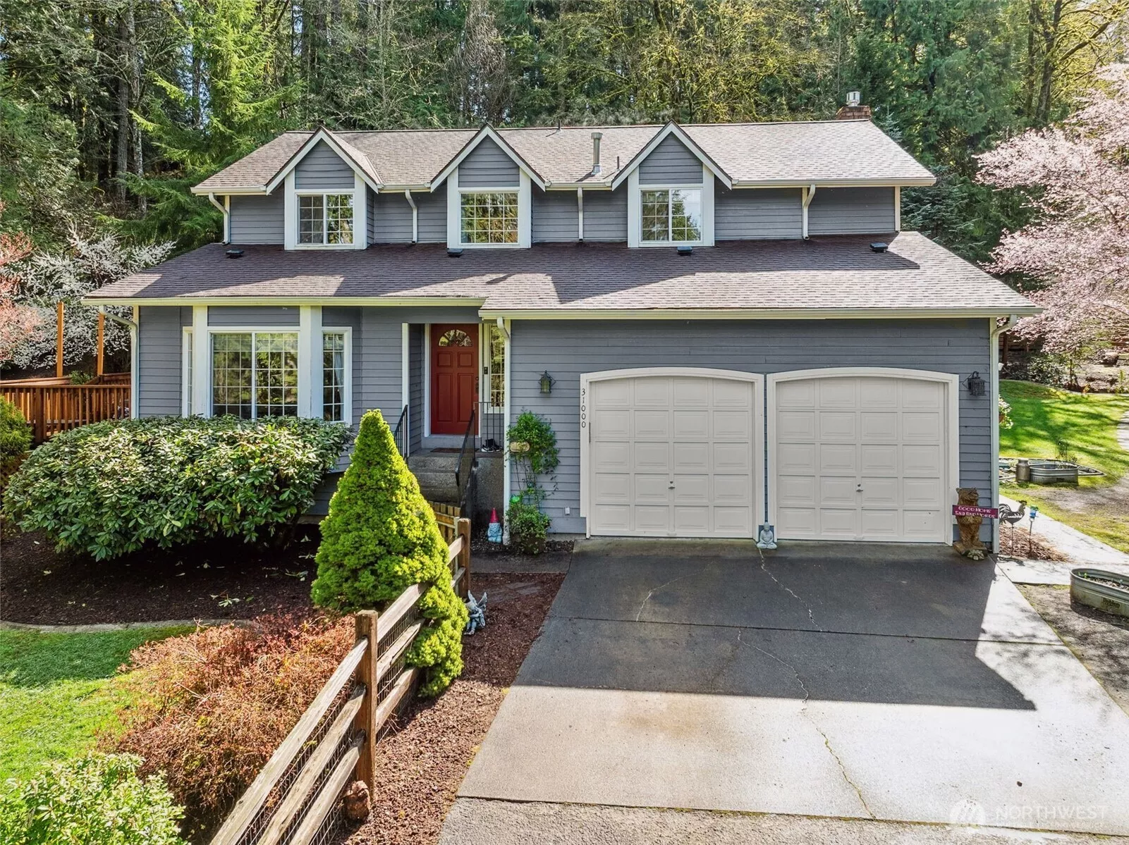 Welcome home to timeless curb appeal, where classic design meets peaceful living.