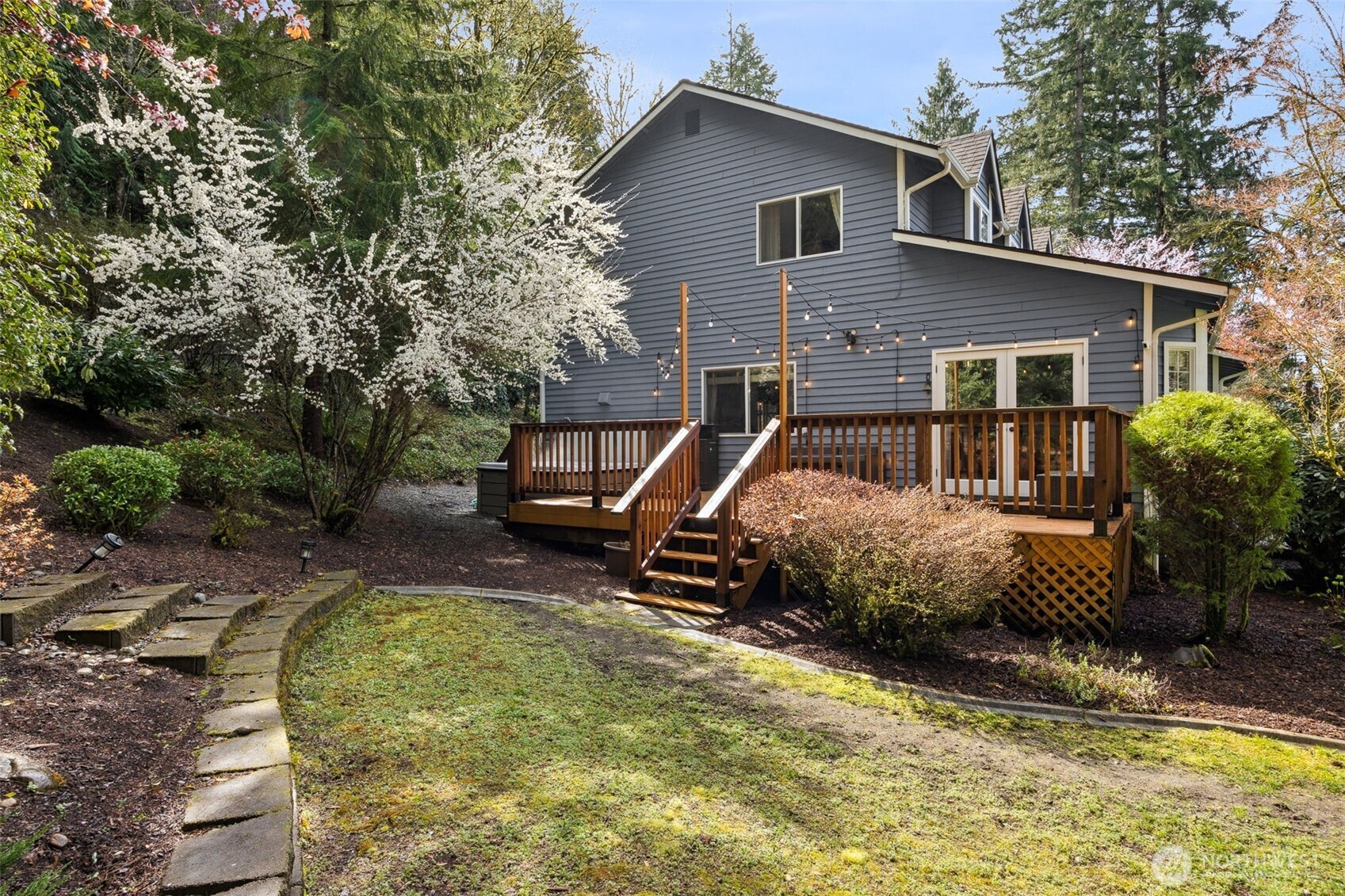 Relax and entertain on the expansive deck with a luxurious hot tub.