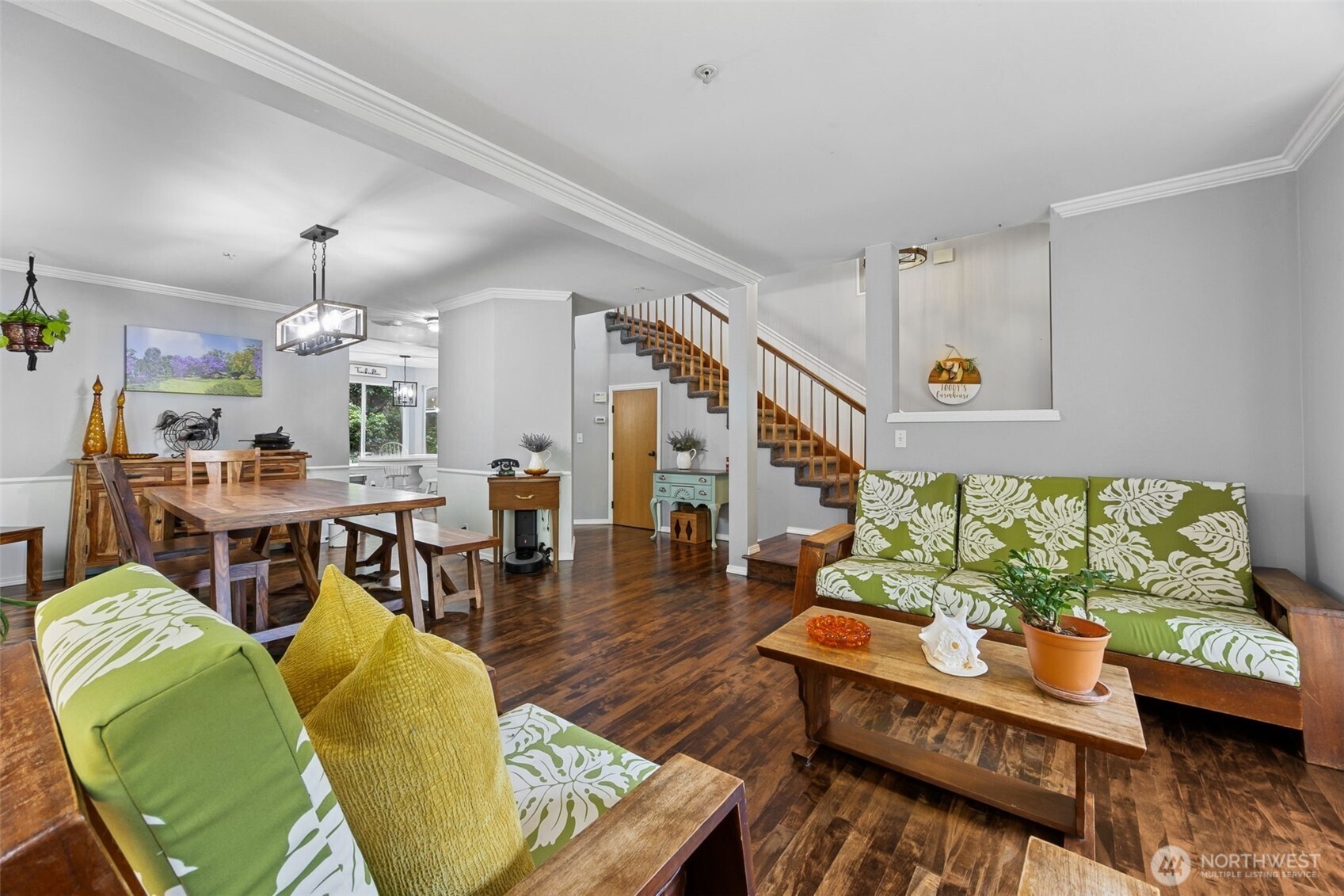 The lounge transitions effortlessly into the dining room, creating a natural flow for gatherings and shared moments.