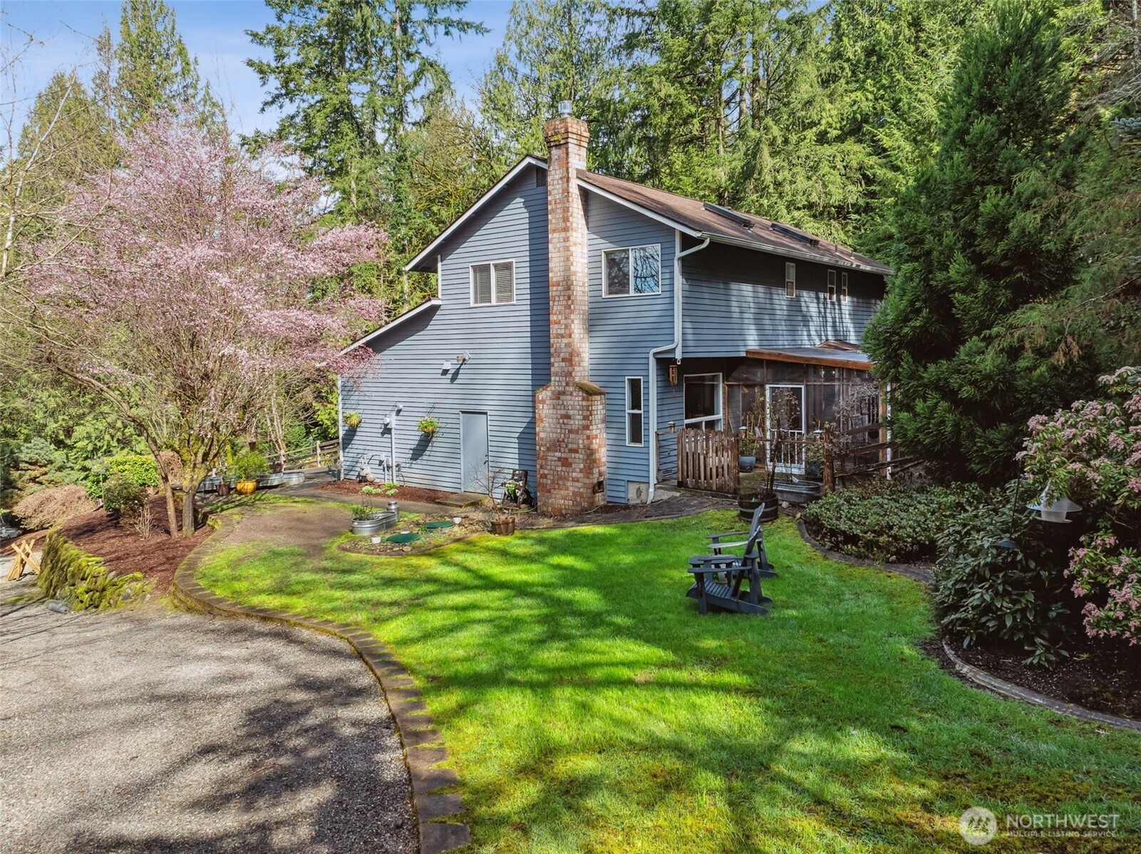 From the deck, enjoy generous outdoor space that leads to the hot tub.  Perfect for gatherings or quiet evenings.