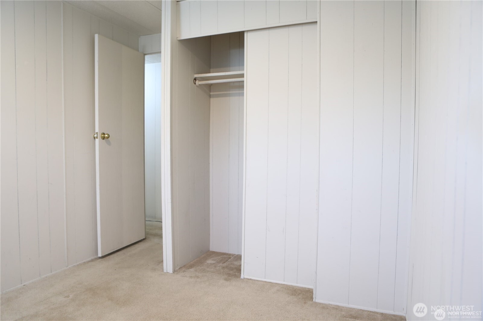Bedroom three, View from the window towards the closet/hall.