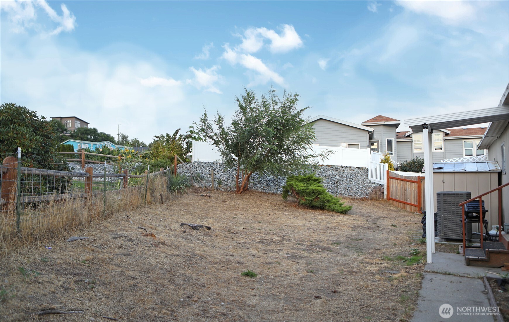 Fully fenced back yard.