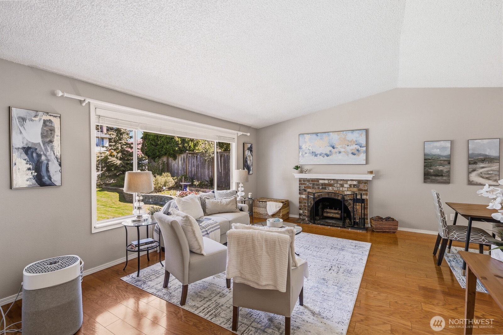 Cozy fireplace and easy care hardwood floors.
