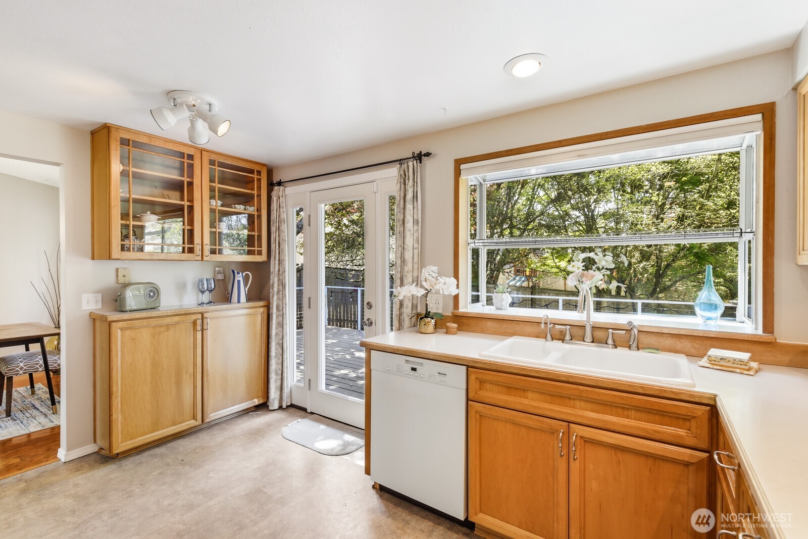 Custom cabinet can work as a butler's pantry.
