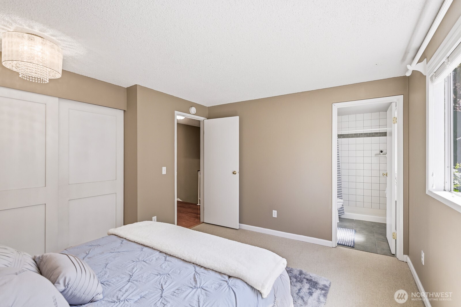 The primary bedroom with bath.